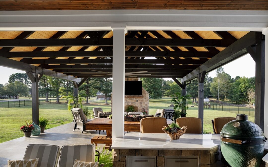 photo of outdoor living space with a-frame support and exposed wood